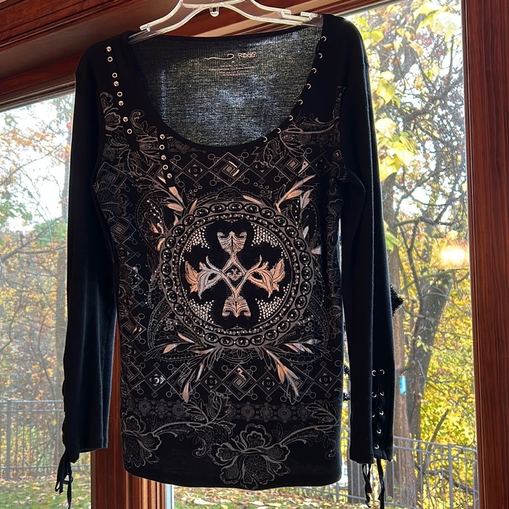 Black with design women’s shirt lots of fun designs and appliqués